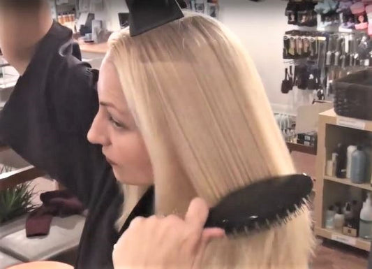 Blow drying with a Grooming Paddle plus